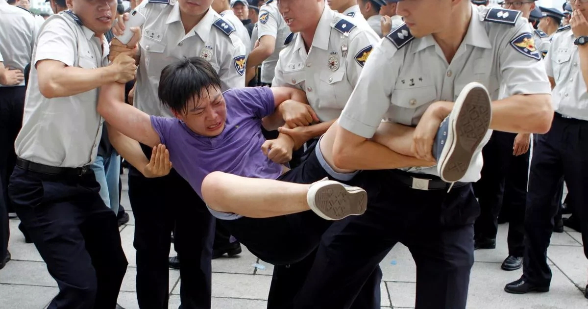 Eight student activists detained after breaching US air base in South Korea
