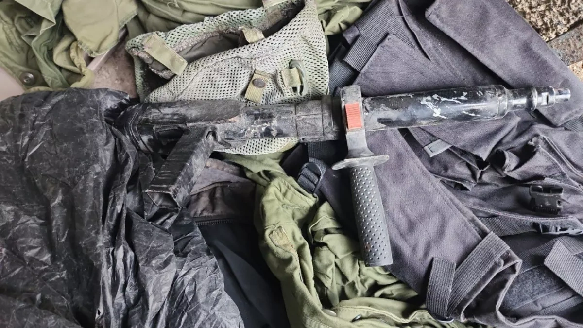 Israeli forces seize arsenal in home of killed attacker photo