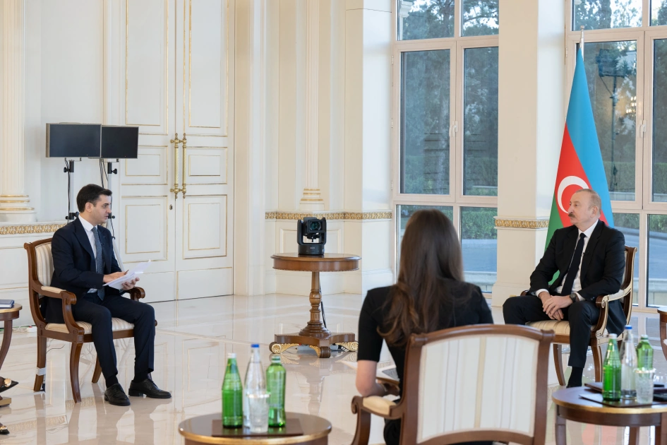 President Ilham Aliyev interviewed by local TV channels (PHOTO)