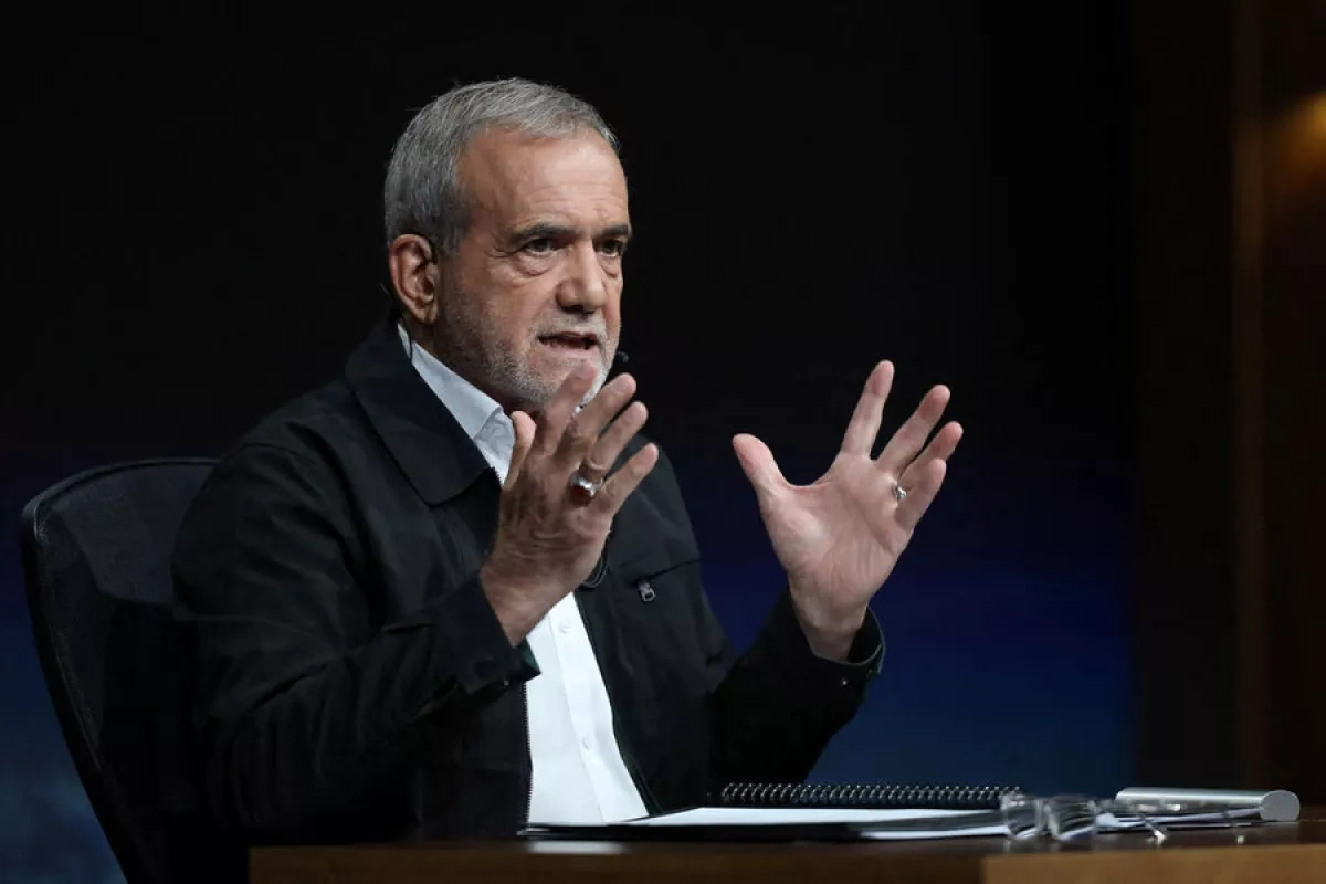 Iranian president says his monthly salary equals $1,000
