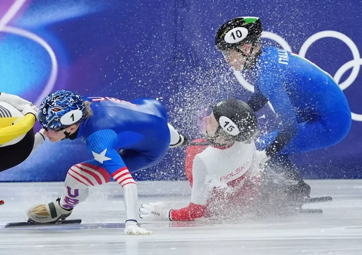 Polish speedskater leaves race on stretcher after skate blade injury to face Photo