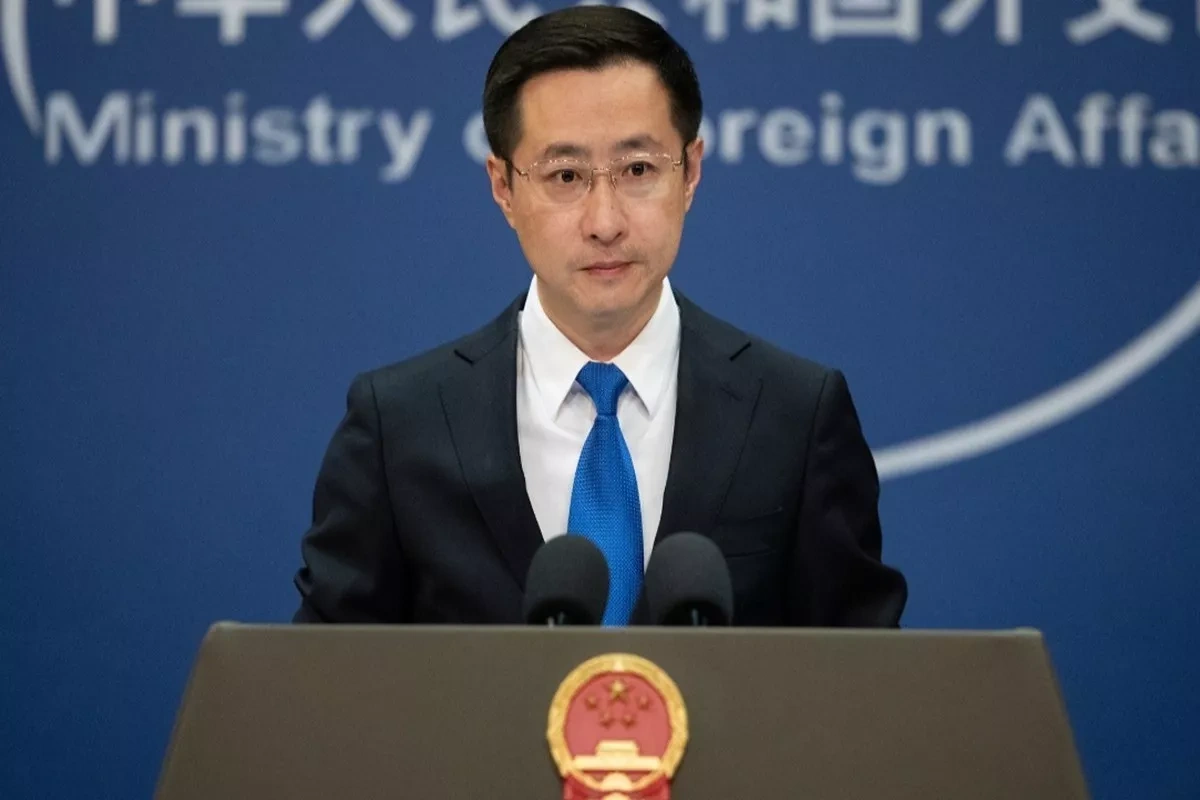 China urges Philippines to end "infringement activities" near disputed shoal