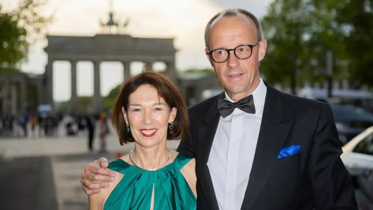 Trump talks politics with German chancellor's wife at NATO summit dinner