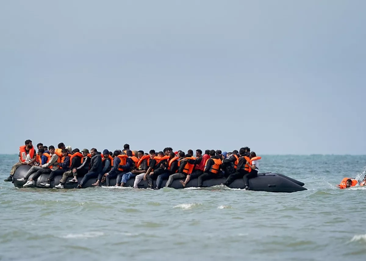 Record 230 migrants cross Channel to UK in single small boat