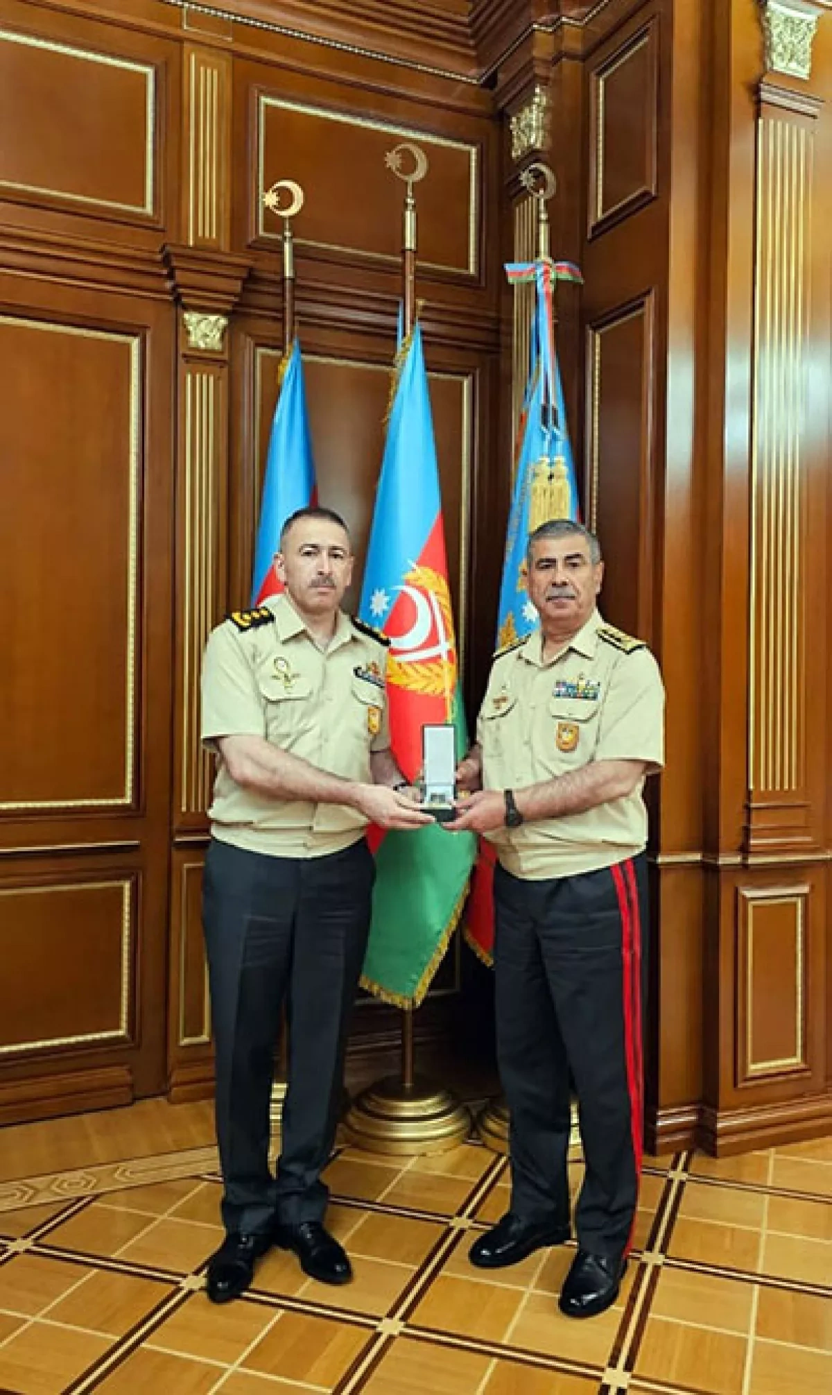 Azerbaijan's defence minister honours director general, group of servicemen