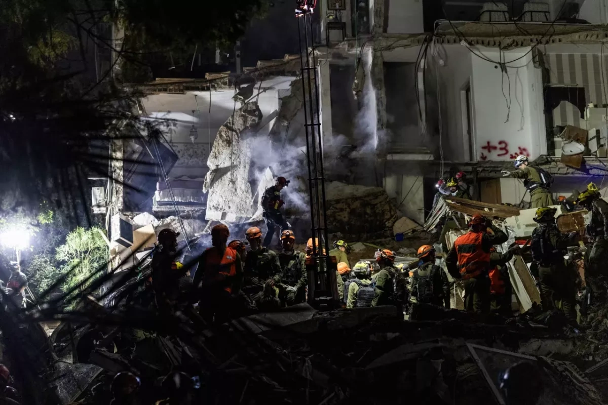 Iranian missile strike destroys six-story building in Israel’s Haifa Search Underway