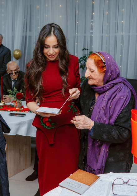 Heydar Aliyev Foundation VP Leyla Aliyeva, Head of Baku Media Center Arzu Aliyeva attend festive event at social services facility for elderly people (PHOTO)