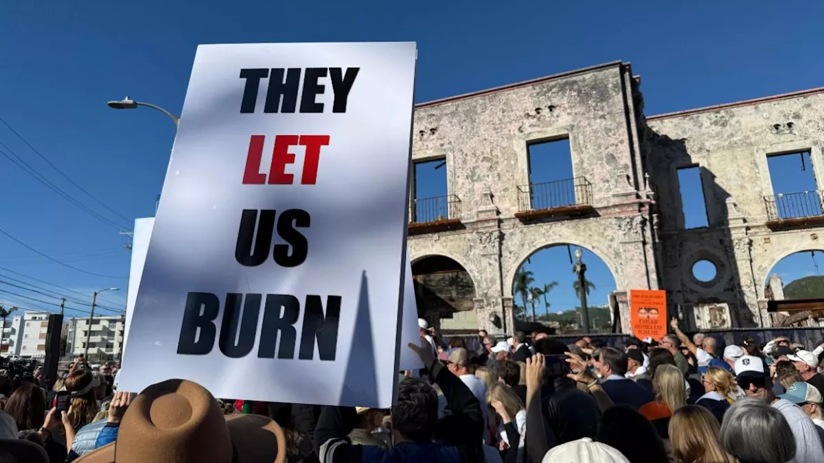 Californians rally in anger over rebuilding efforts one year following LA wildfires