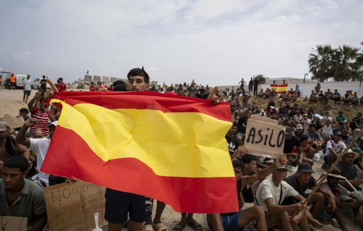 Ceuta migrants demand asylum as Spain weighs their return to Morocco