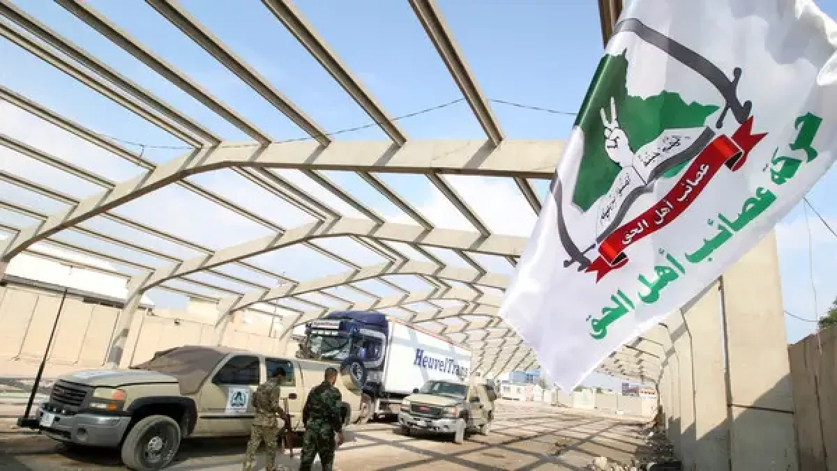 Media: Iraqi armed group announces move to hand weapons to state control