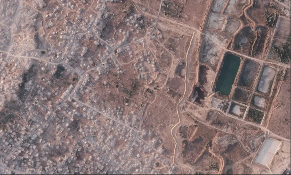 AP: Israel builds extensive earthen barrier inside Gaza Satellite images show