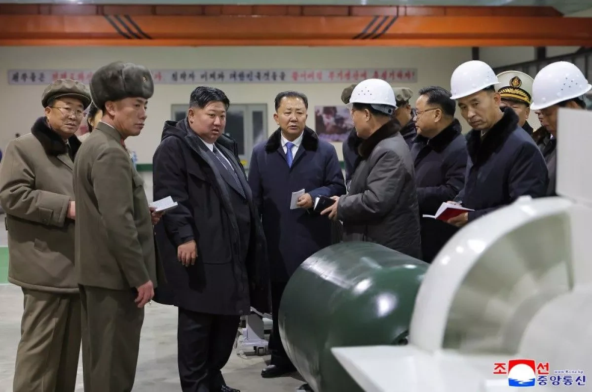 North Korean leader inspects facility developing "secret" submarine weapons PHOTO
