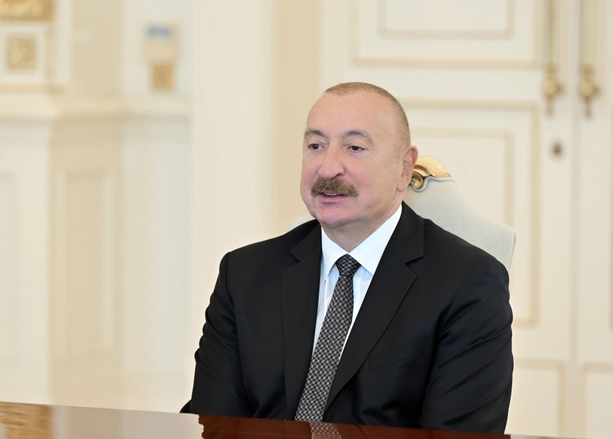 President Ilham Aliyev receives UK Minister of State for Trade (PHOTO)