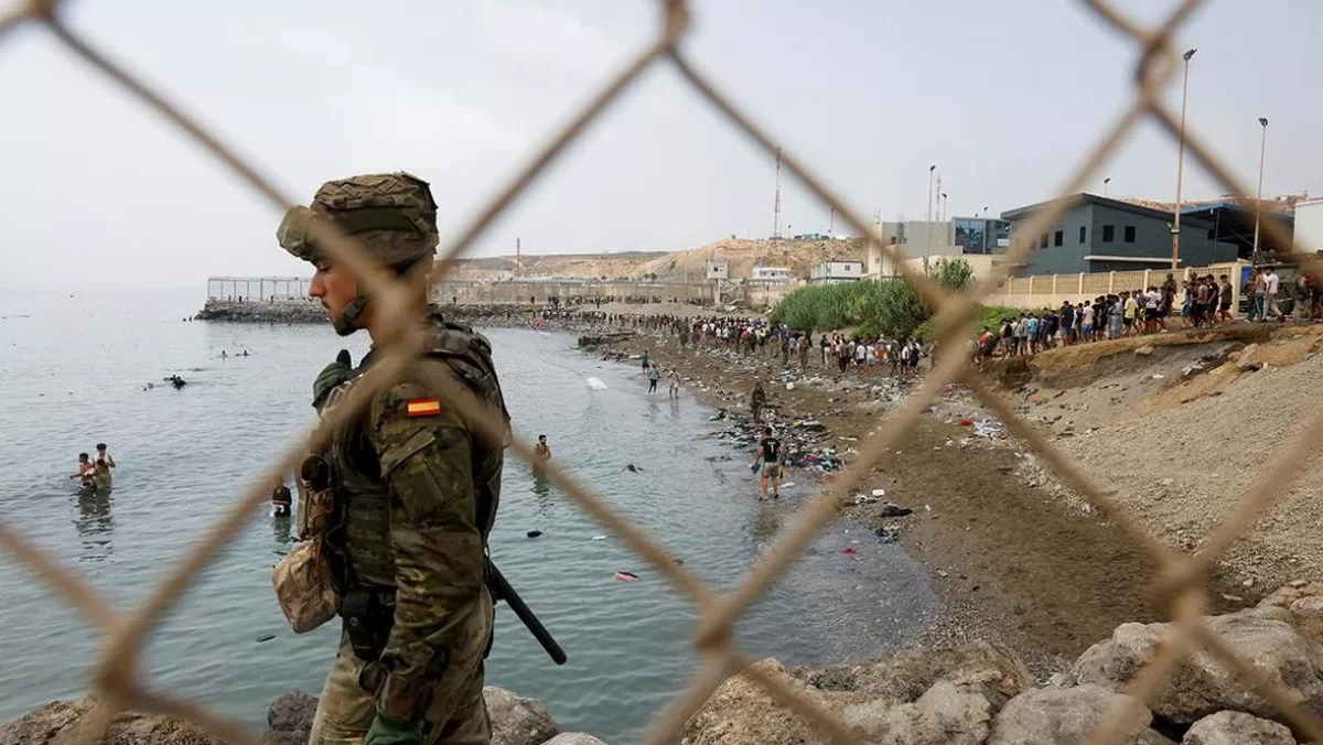 Spain hunts for suspected jihadists after Ceuta migration surge
