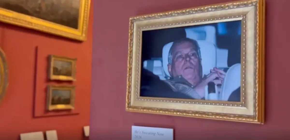 Activists briefly display arrest photo of Prince Andrew at Louvre VIDEO