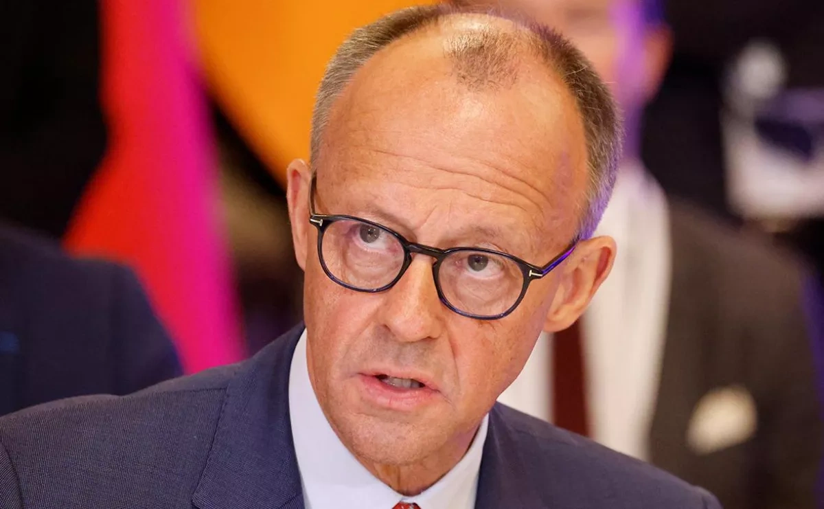 German chancellor acknowledges internal disputes slowing down government performance