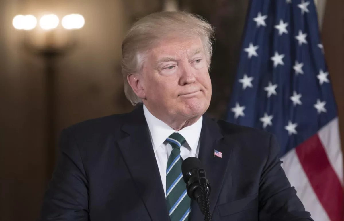 Trump stops short of withdrawal, demands greater international role against Iran