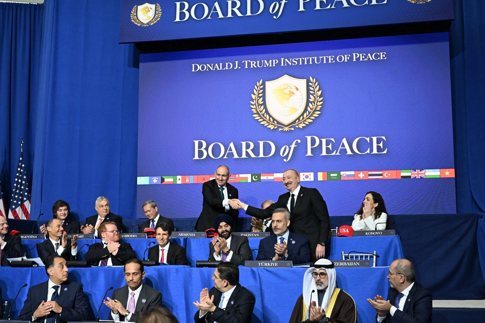 President Ilham Aliyev, Armenian PM shake hands in front of 'PEACE' word – Hikmet Hajiyev