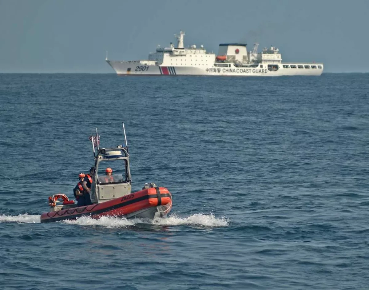 French coastguards rescue 157 from burning migrant boat