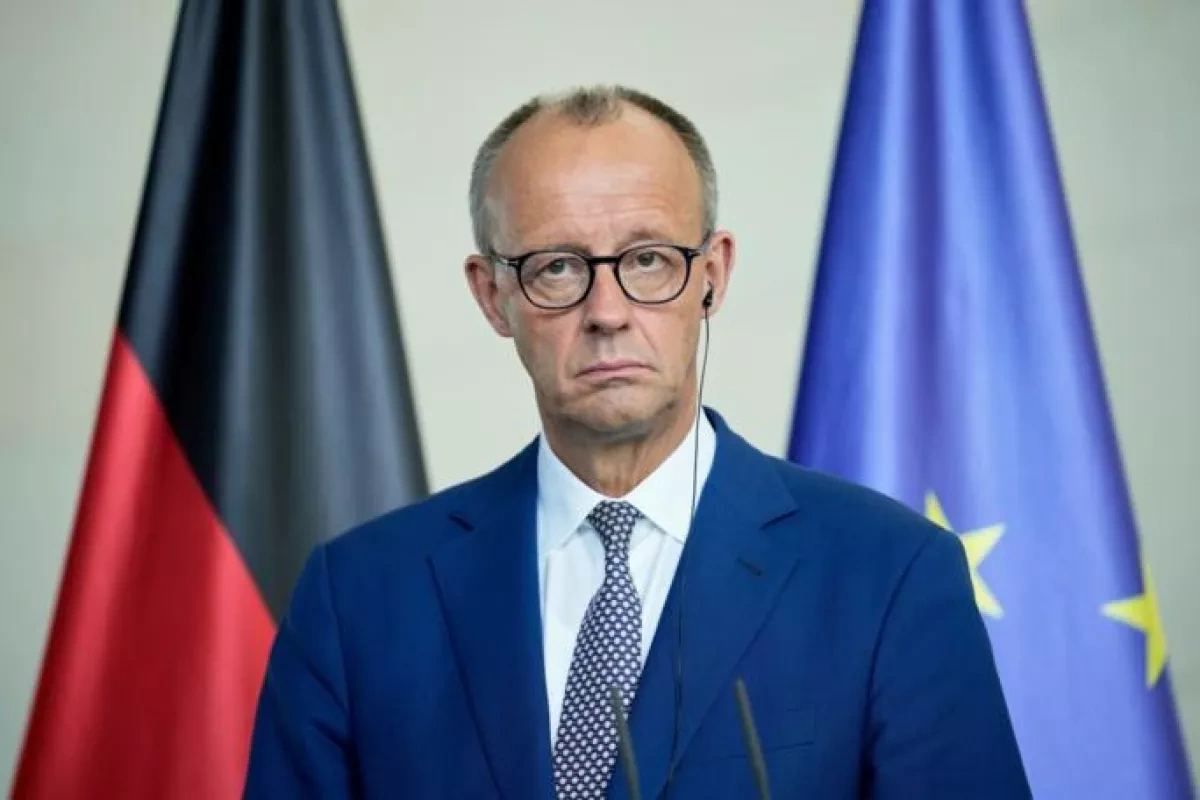 German chancellor faces heckling at Baltic Sea campaign event