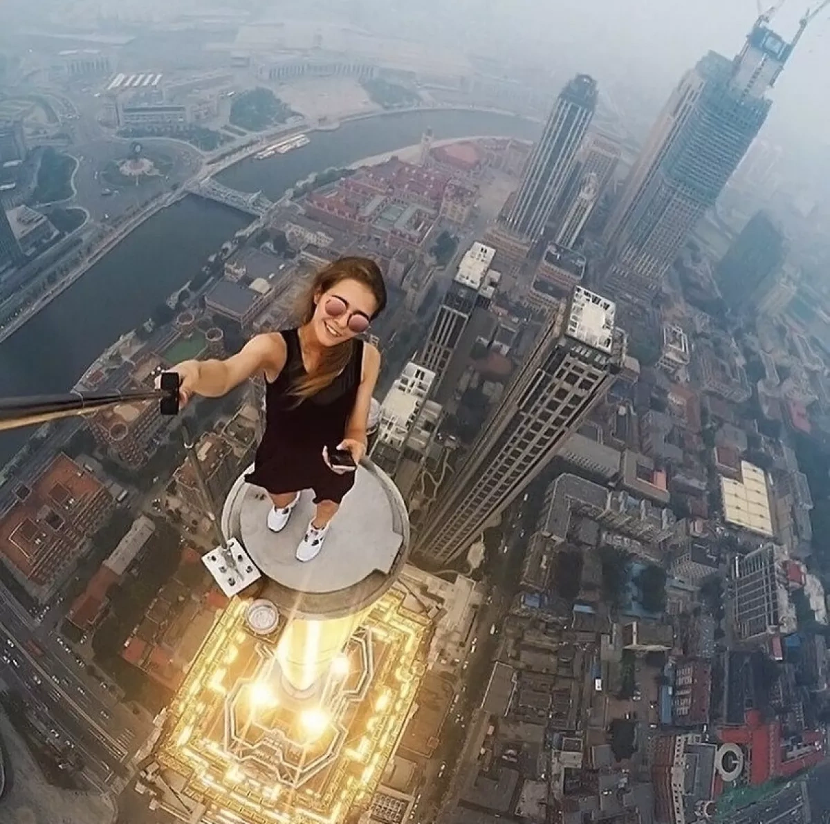 Adrenaline-seeking Russian couple behind viral extreme climb in New York City