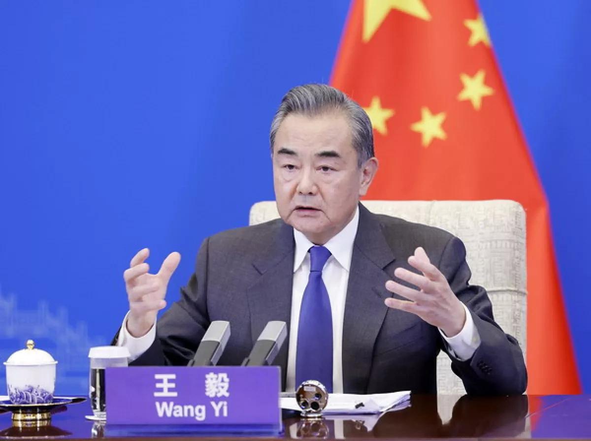 FM Wang Yi urges UK to uphold one-China principle, build stable future ties