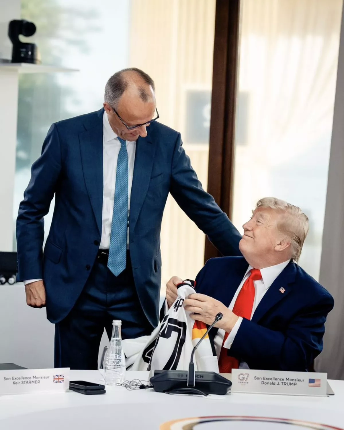 German chancellor gives symbolic birthday gift to Trump at G7 summit