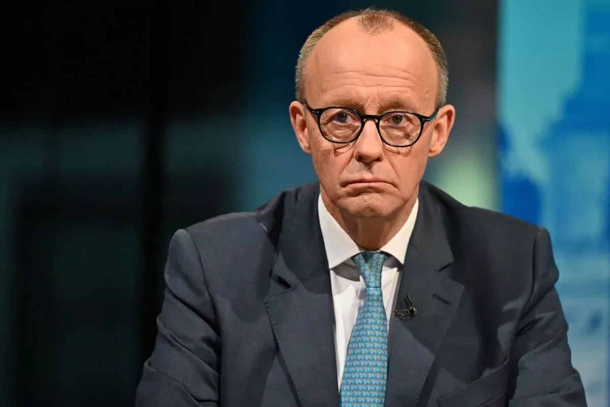 Germany’s Merz faces pressure, but chancellery chief says he is staying