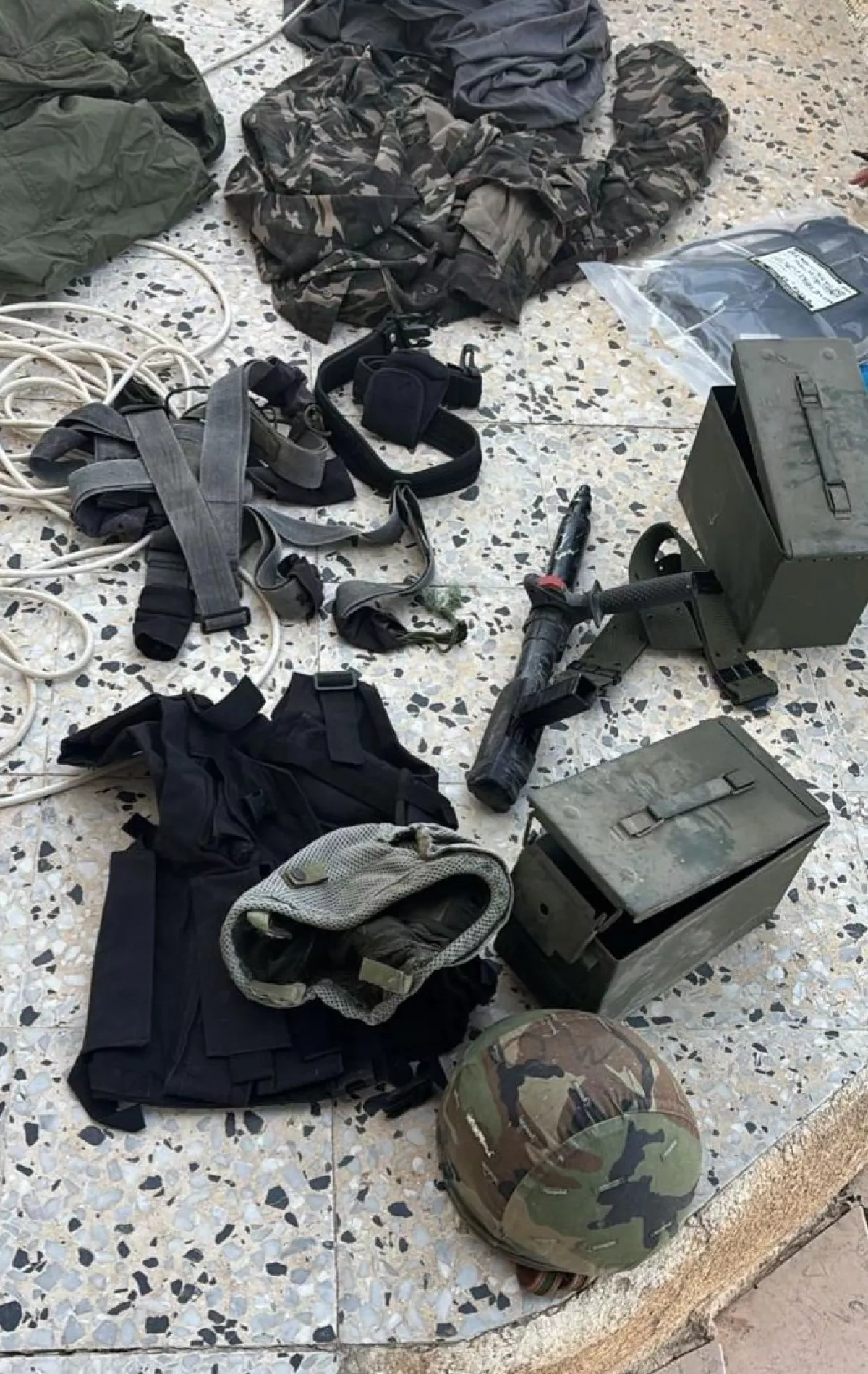 Israeli forces seize arsenal in home of killed attacker photo