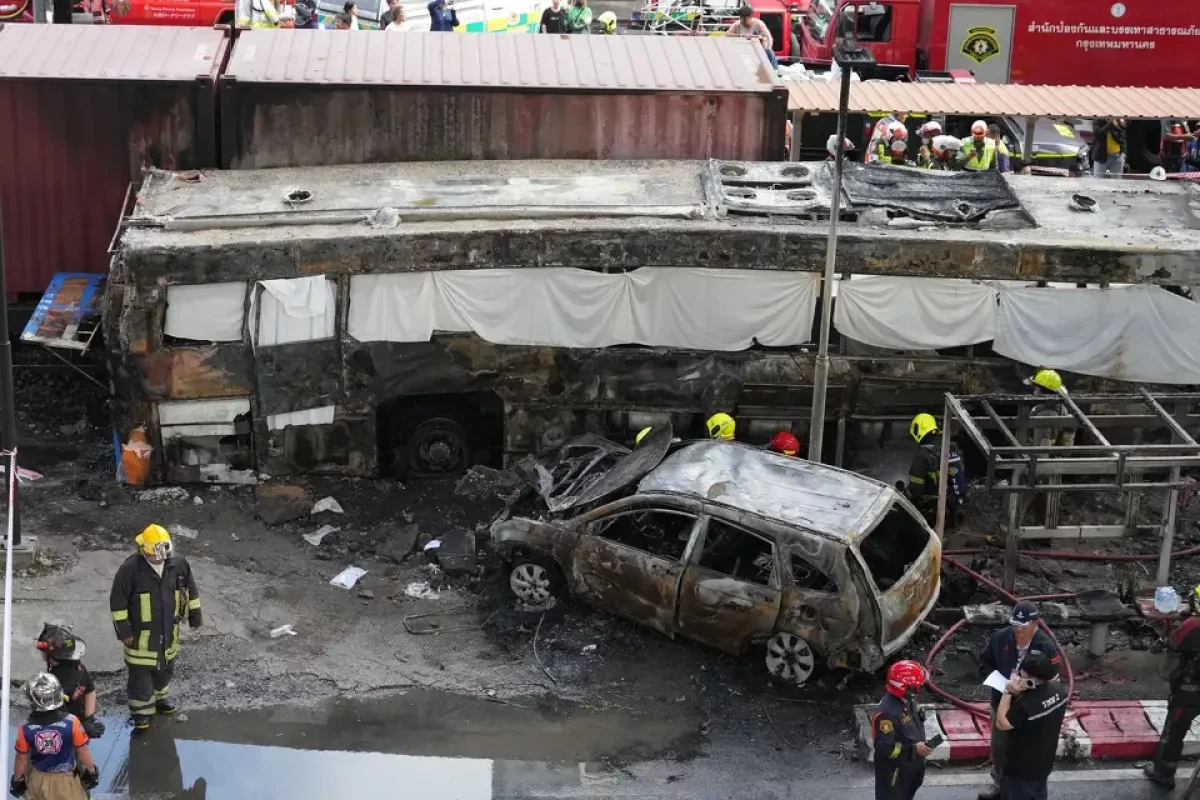 Freight train crashes into bus in Bangkok, killing at least eight