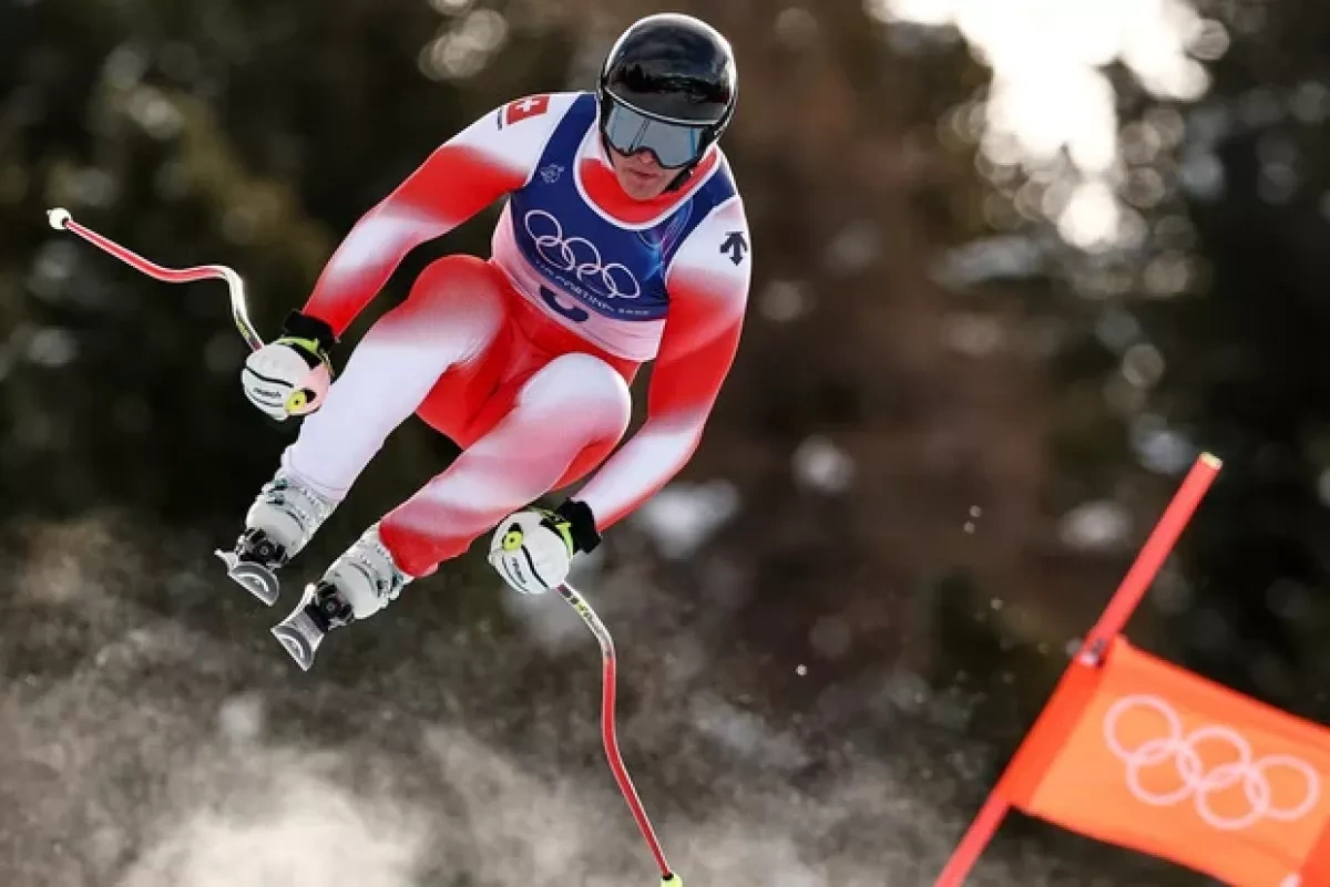 Swiss skier wins first gold of Milan–Cortina 2026 winter games
