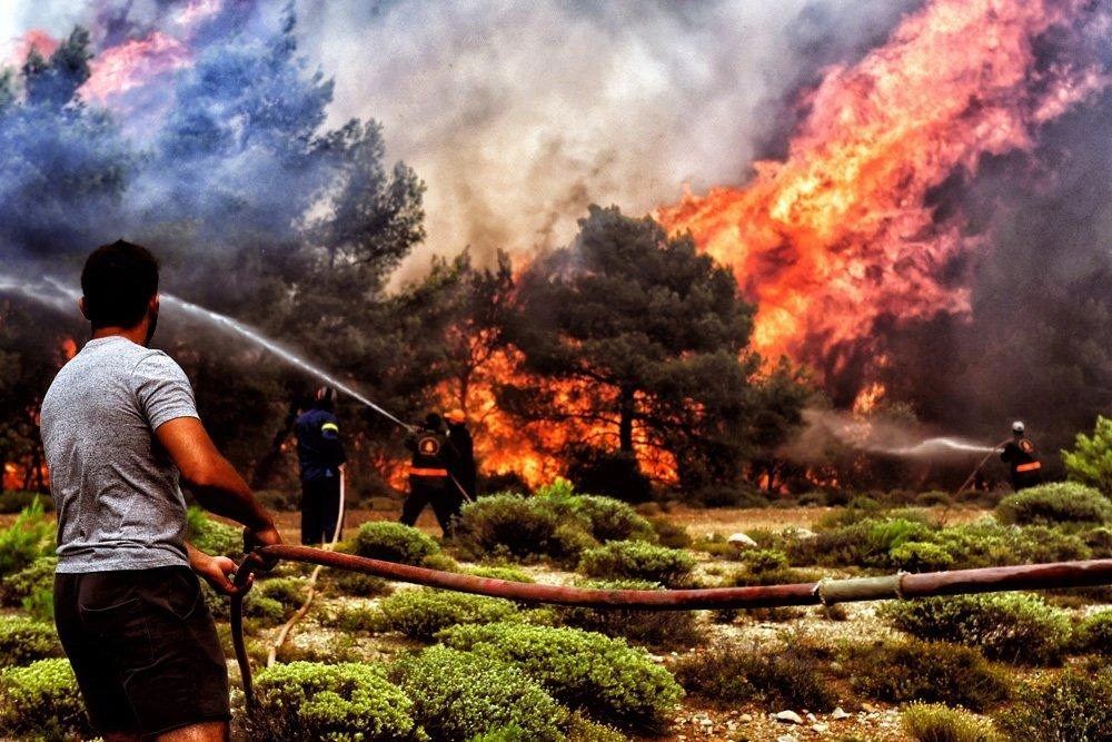 Washington wildfires force 60,000 evacuations, destroy hundreds of buildings VIDEO