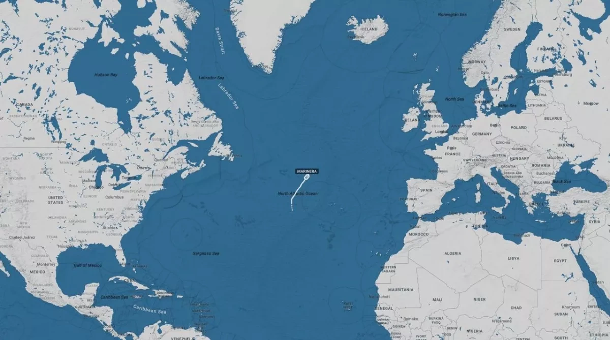 Tanker fleeing US pursuit changes flag, arrives in Russian port