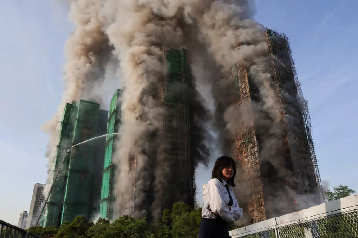 Survivors of deadly Hong Kong estate fire push for rebuilding on original site