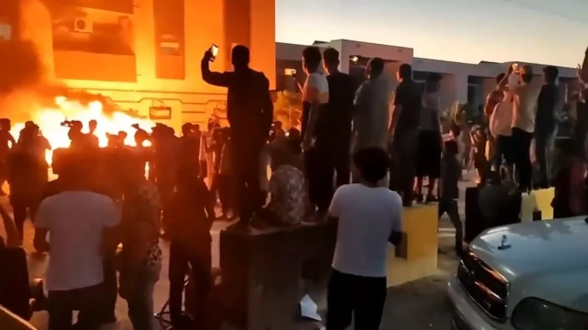 Football fans set fire to government building in Libya