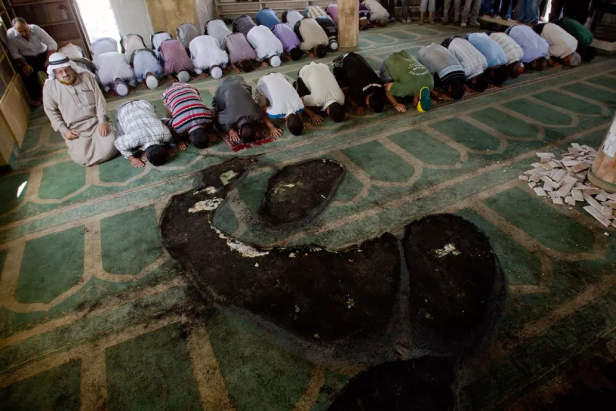 Mosques burned, homes damaged in West Bank settler violence PHOTO