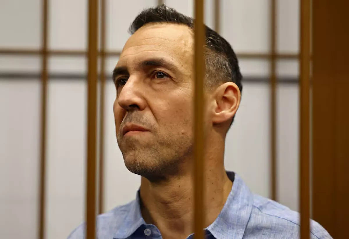 French researcher freed in prisoner swap with Russian basketball player