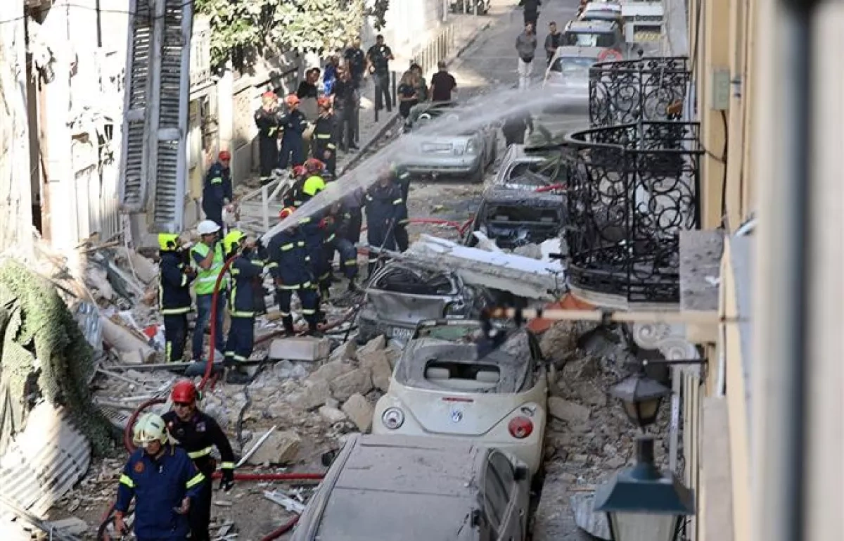 Building collapses after explosion in central Athens