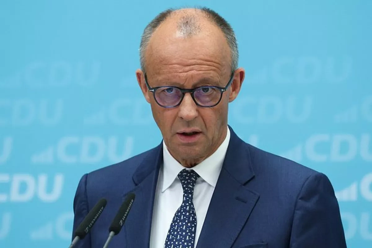 German Chancellor calls for tougher curbs on high-risk suspects after Berlin attack